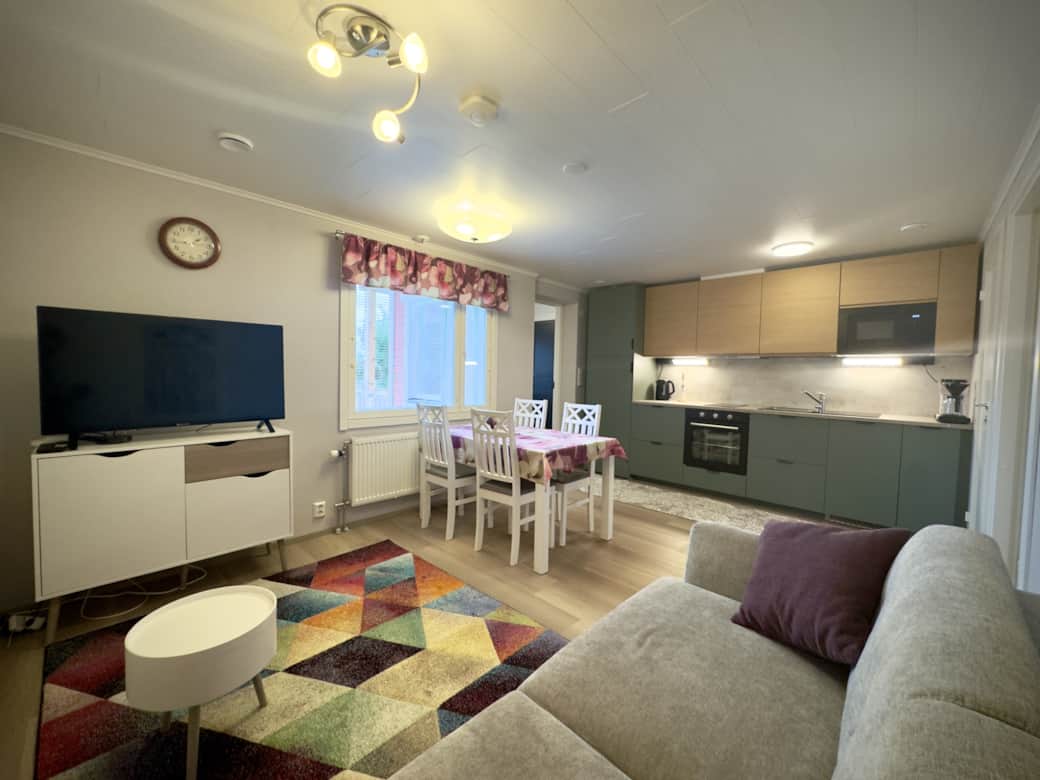 The living room offers a beautiful view of the Ylläs fells.