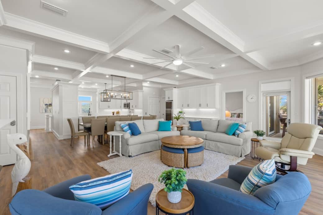 Great room with family room, dining room, and kitchen all overlooking the beach.