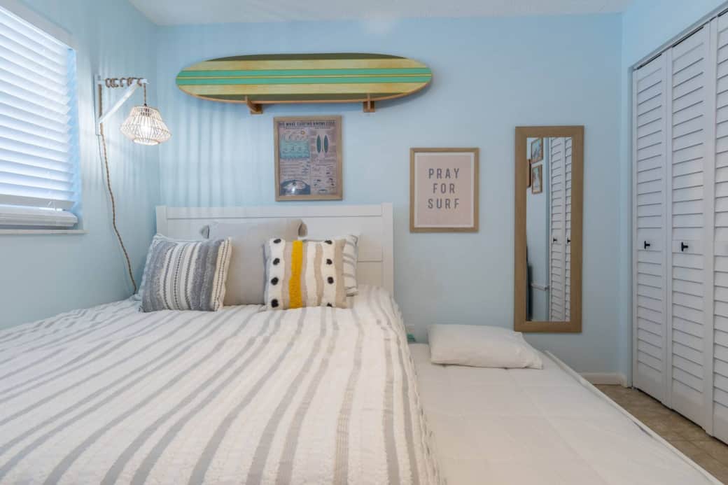 Our queen bed with twin trundle bed is perfect for families of all sizes. The queen bed is spacious and comfortable, and the twin trundle bed can be pulled out to accommodate an extra guest. 