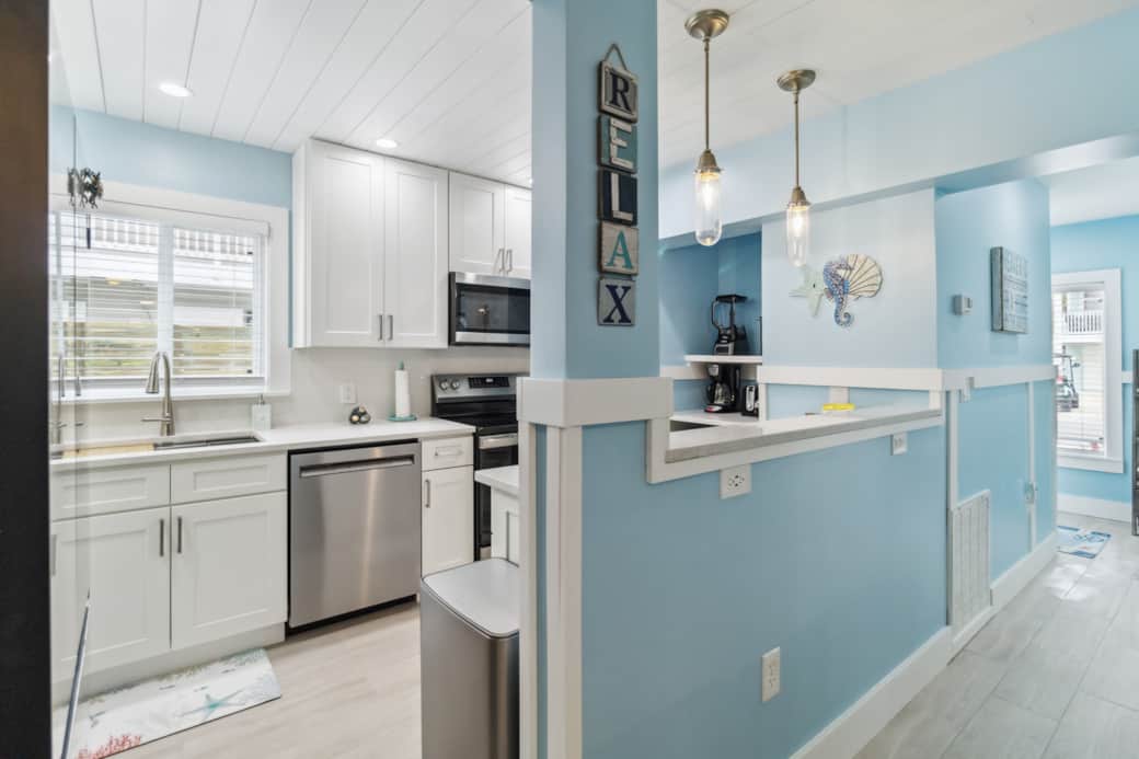 Kitchen, dishwasher, oven, microwave, full size fridge, beverage fridge 