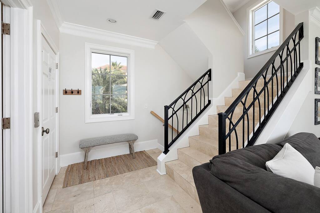Stairs leading to third floor.  Elevator is the door on the left.