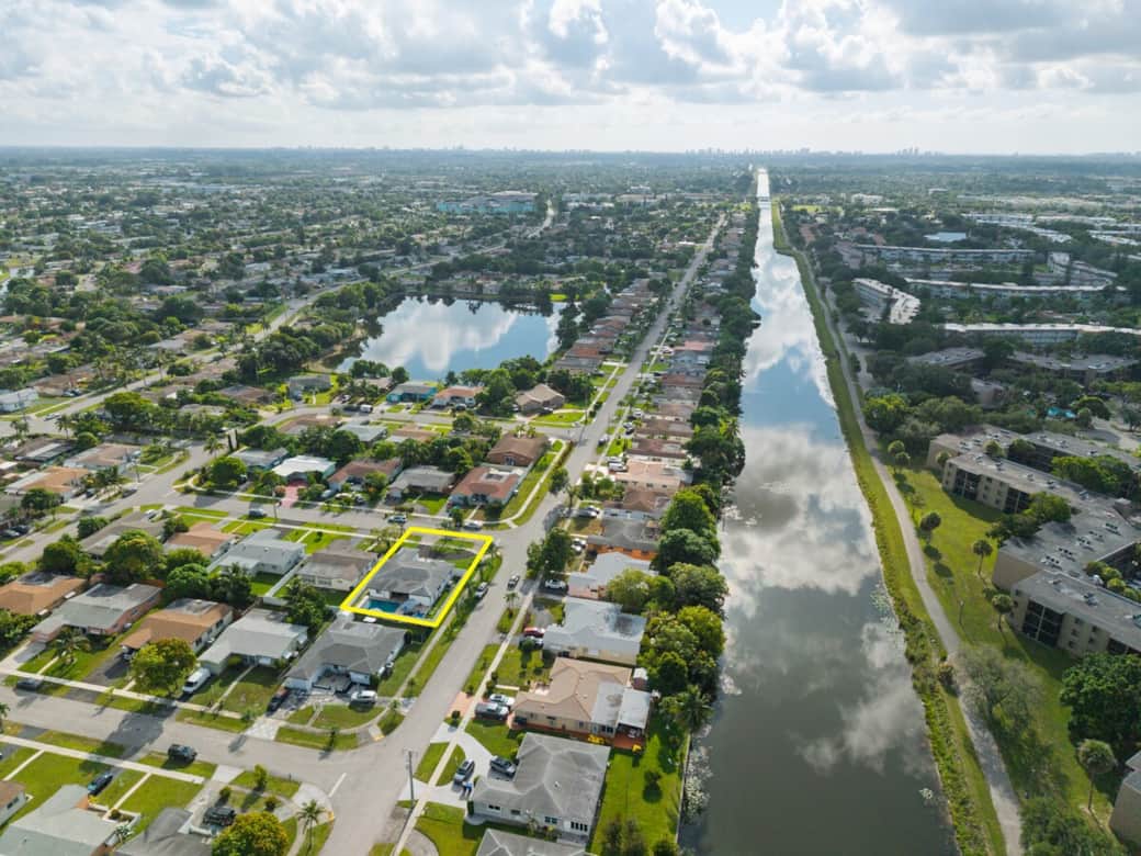 Bird’s-eye perspective highlighting the full property layout, including the private backyard and pool—designed for seamless indoor-outdoor living.
