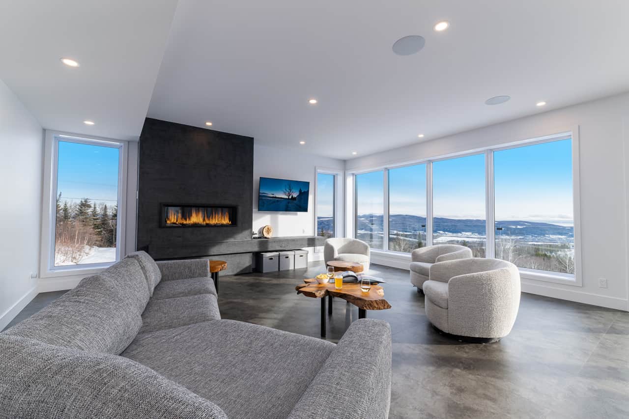 Living Room – Gas Fireplace – River & Mountain Views – Main Floor