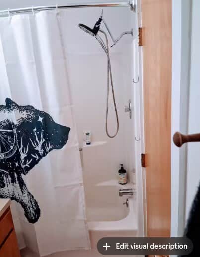 Clean 1st floor en-suite full bathroom with ceiling fan. Curved shower bar for space, large shower head with detachable wand.