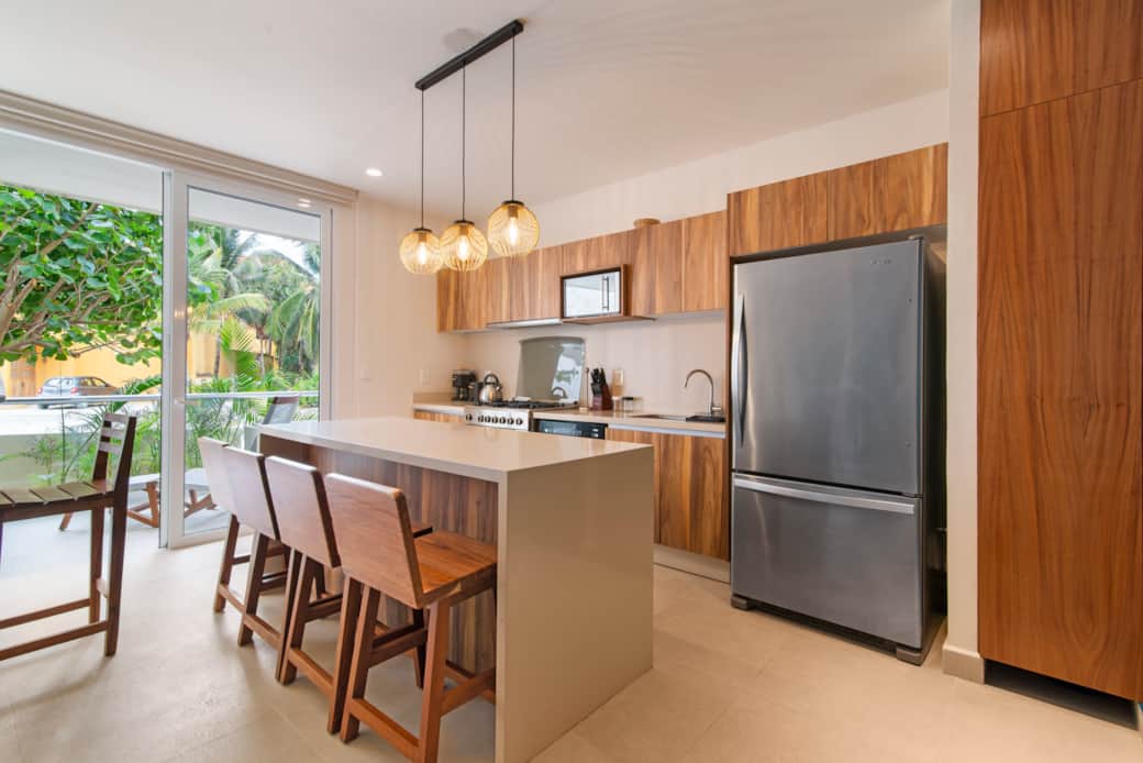 Dine in comfort at the kitchen island, with seating for up to four on cozy stools.
