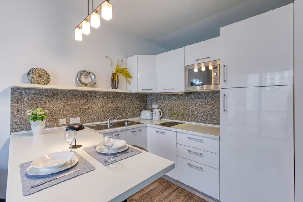 Fully equipped kitchenette and dining space