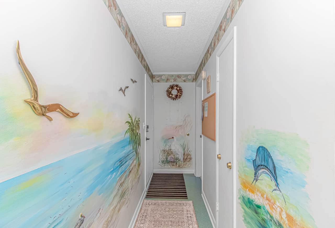 Welcoming entry hallway with coastal-inspired touches