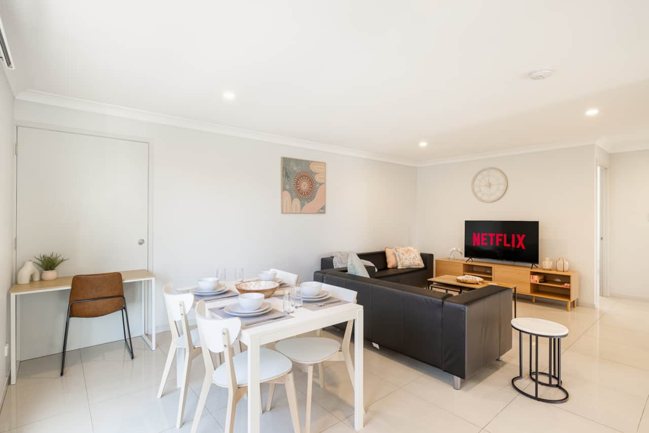 Dining Area: Integrated dining area within open living layout 