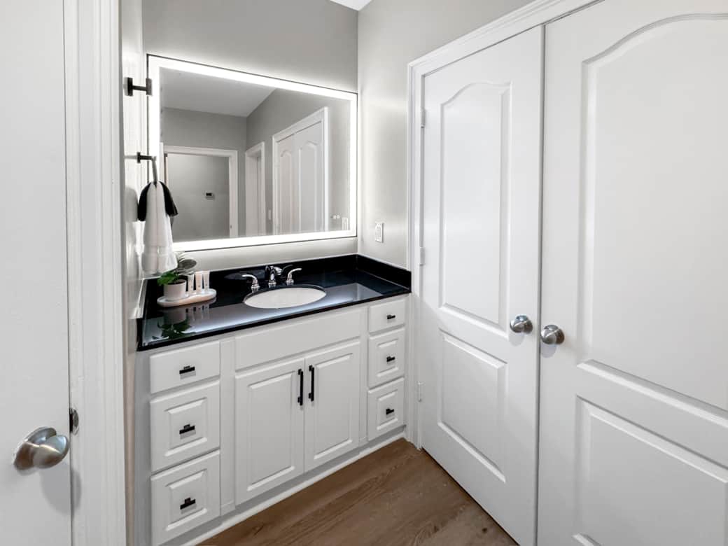 Stadium/Main Bathroom with Full Size Laundry