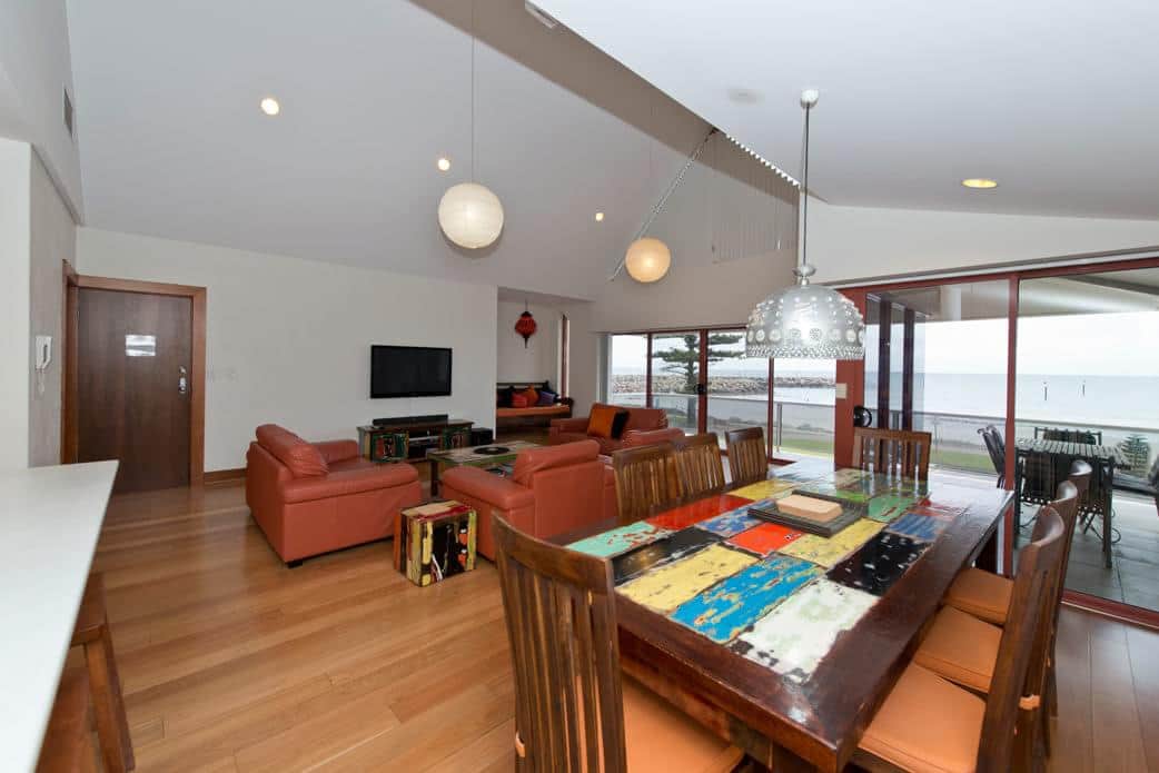 Dining and living zone with water views