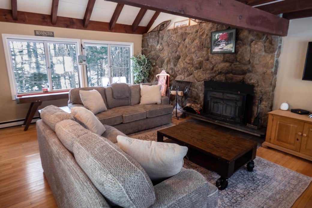 Cozy up by the wood burning fireplace in the living room Cozy up by the wood burning fireplace in the living room