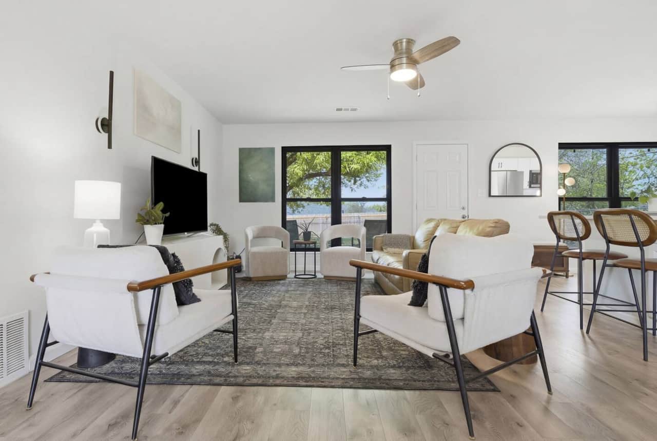 Couch and 4 comfy chairs for socializing or watching tv
