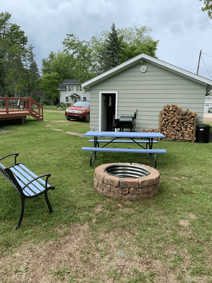 Spacious backyard with firepit