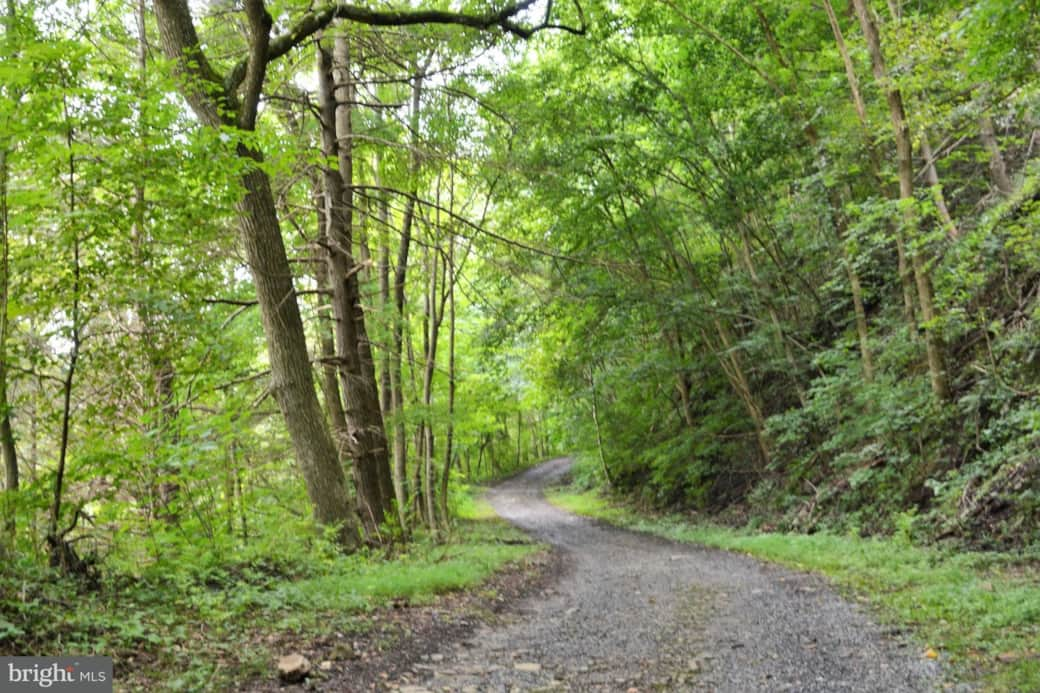 The driveway is long and winding