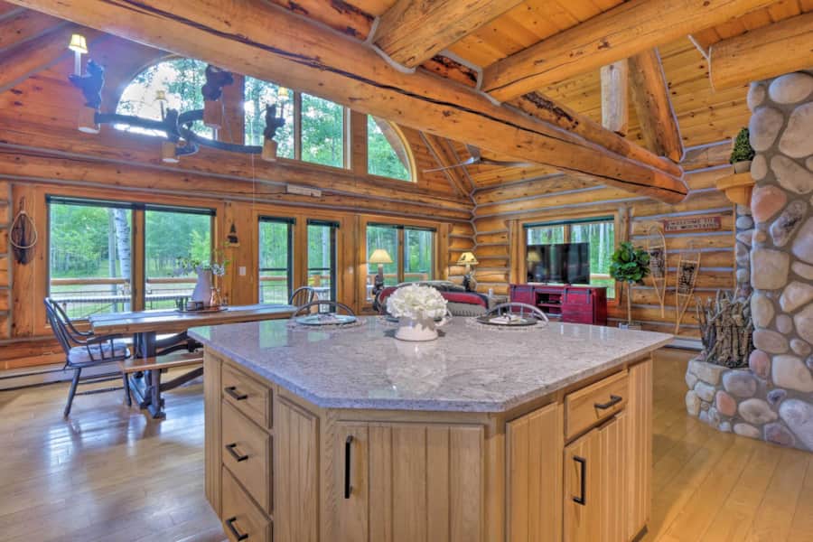 Remodeled chef's kitchen with granite island and mountain views