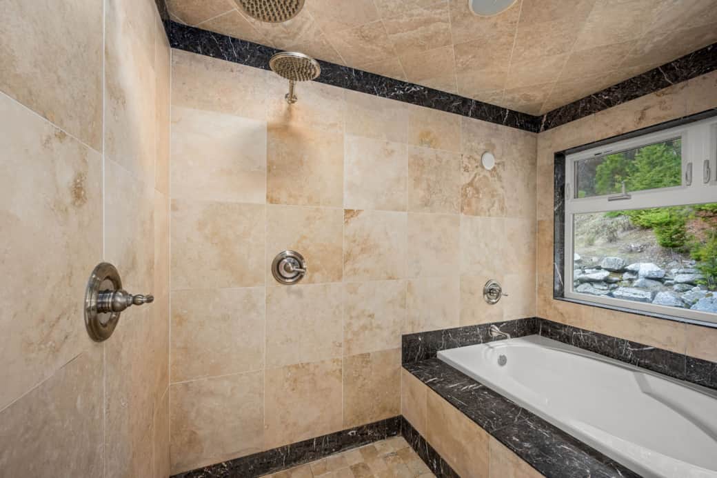Master walk-in shower with oversized tub