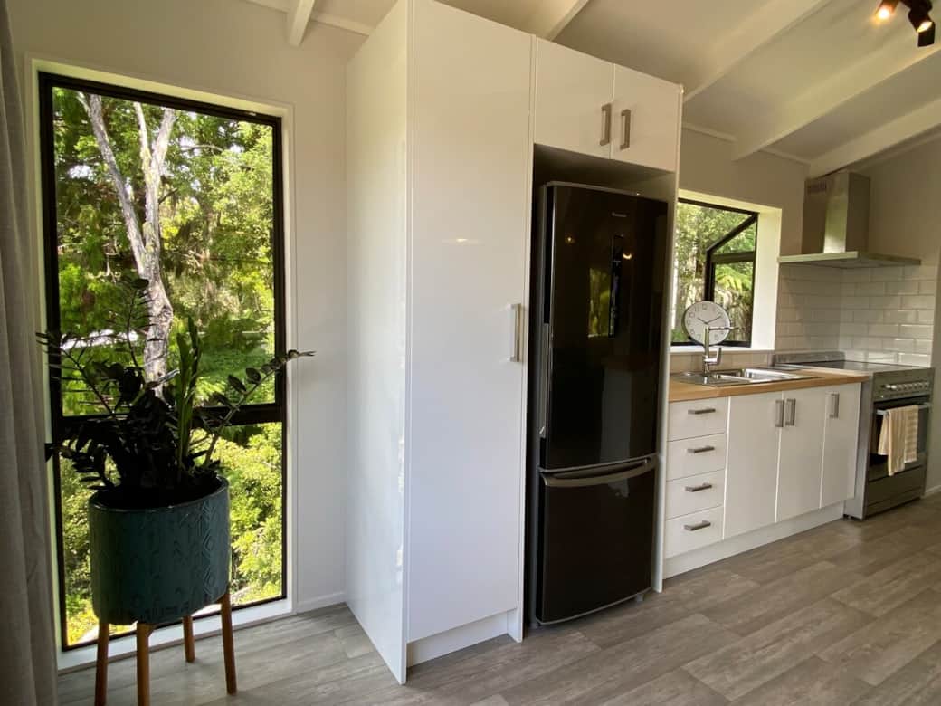 Generous kitchen storage and full size fridge. Everything you need