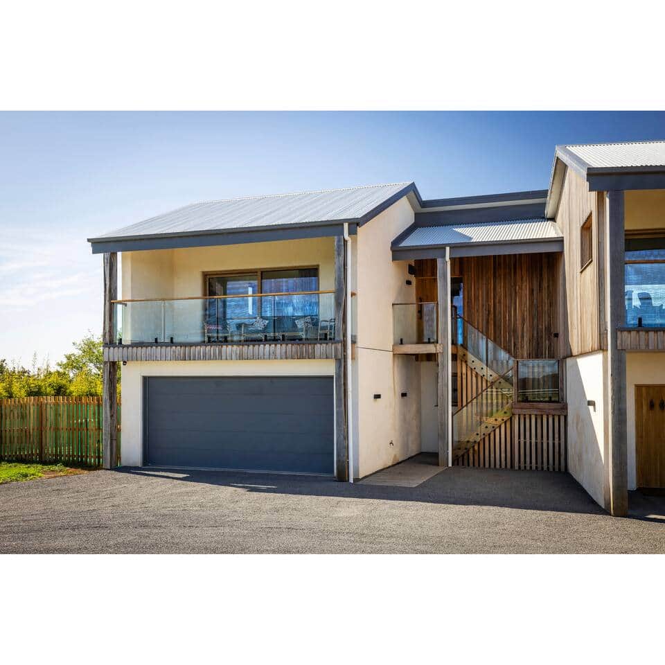 Balcony and staircase with parking in front of staircase. Balcony and staircase with parking in front of staircase.