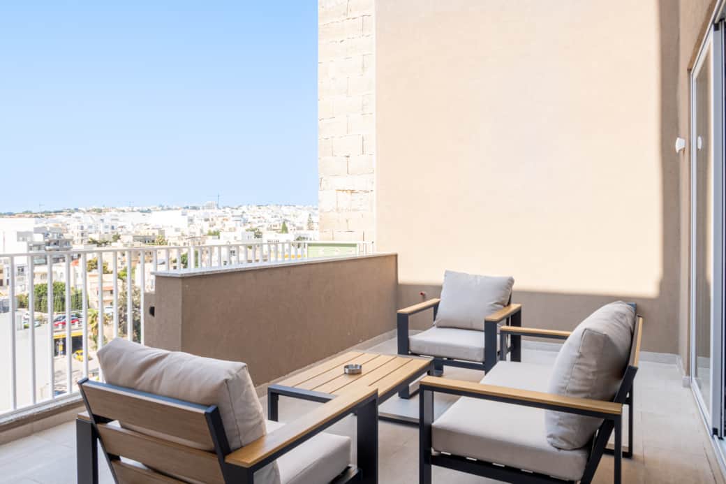 Enjoy the sunny terrace with city views