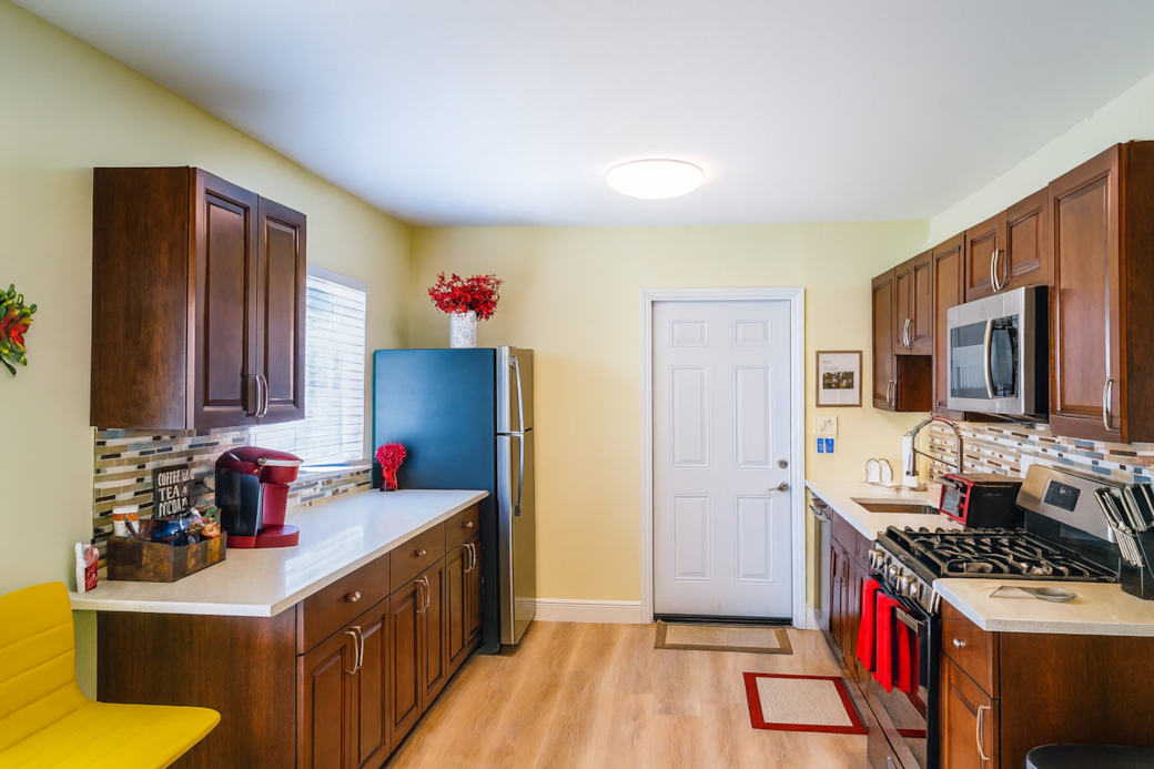 Kitchen with gas stove.