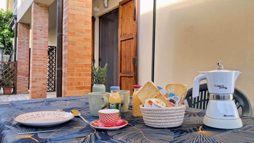 Gazebo with table and chairs: the perfect place to enjoy breakfast outdoors during the warmer months Gazebo with table and chairs: the perfect place to enjoy breakfast outdoors during the warmer months