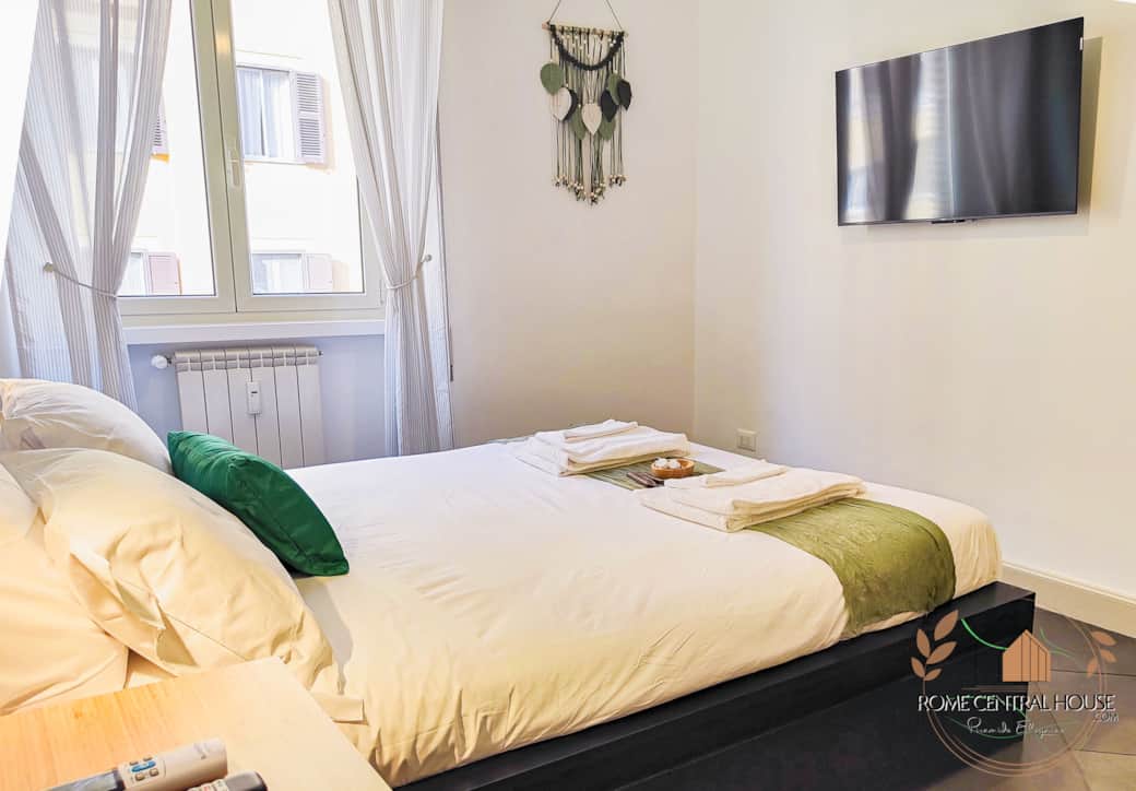 Stanza Verde accogliente calda ed equipaggiata. Aria condizionata, Netflix, 4 cuscini, WiFi