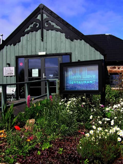 Ninth Wave restaurant entrance and flower garden near Fionnphort on Mull