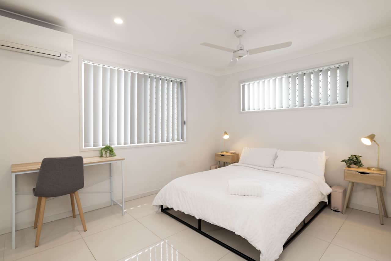 Bedroom: Peaceful bedroom with cozy design and ample storage 