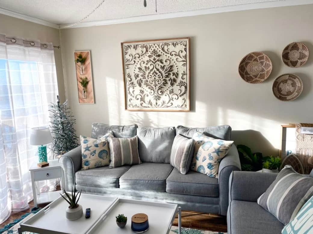 Living Room Features a Queen Sleeper Sofa, love seat and Twin Hide-a-way bed