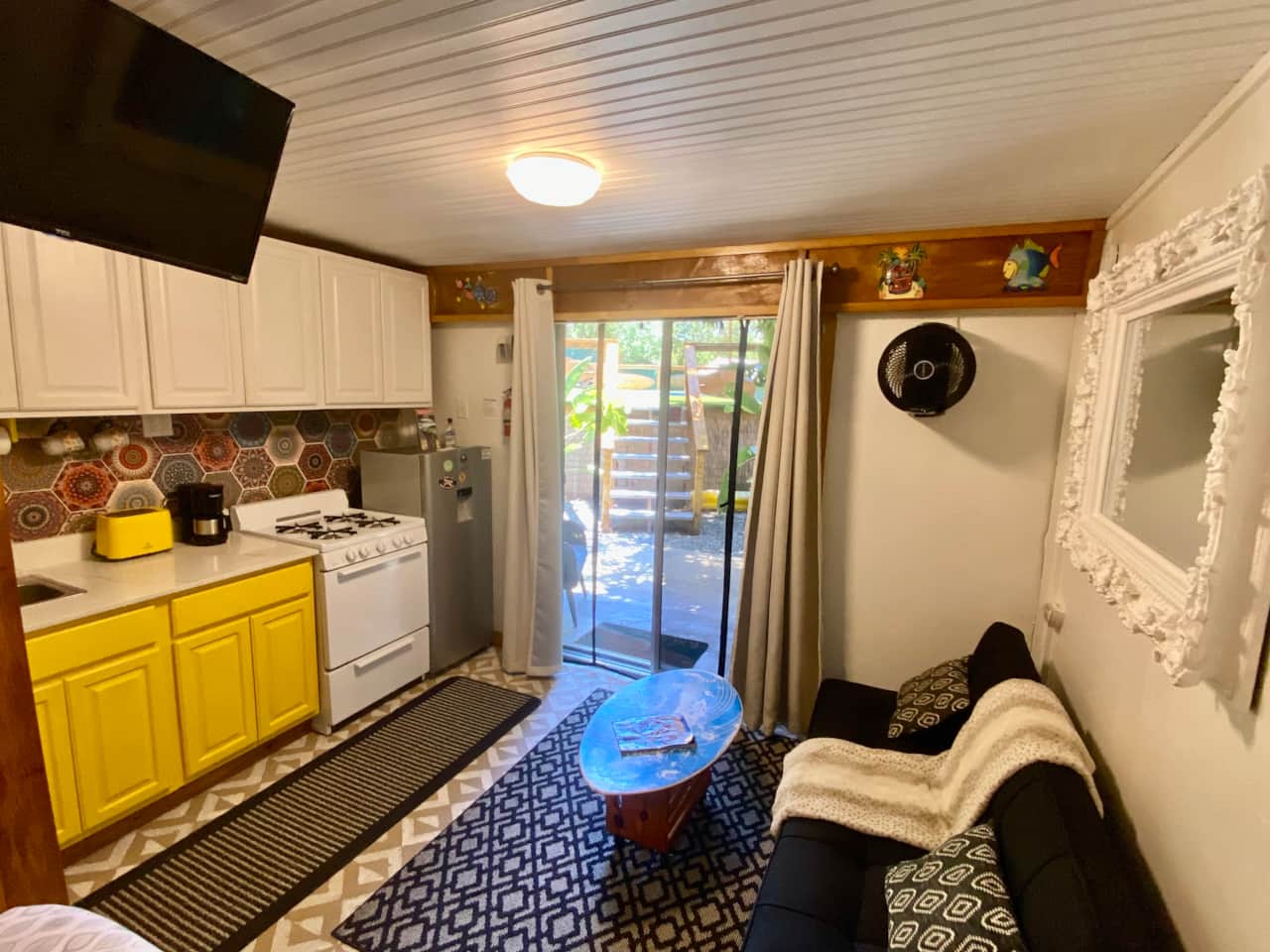 kitchen sitting area, exclusive patio area just steps from swimming pool.