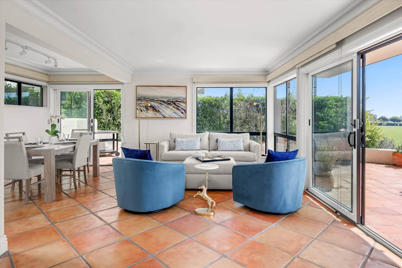 Inside, the living room opens straight onto the view