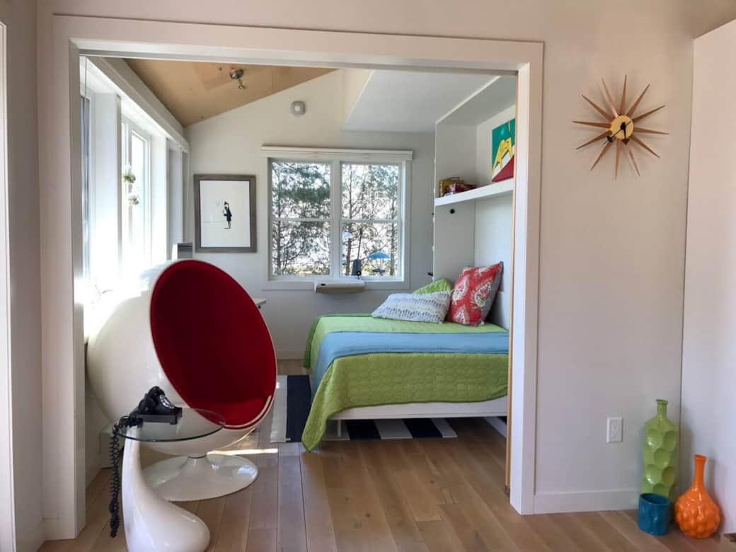 The second bedroom is full of windows and has top-down/bottom-up shades. The second bedroom is full of windows and has top-down/bottom-up shades.