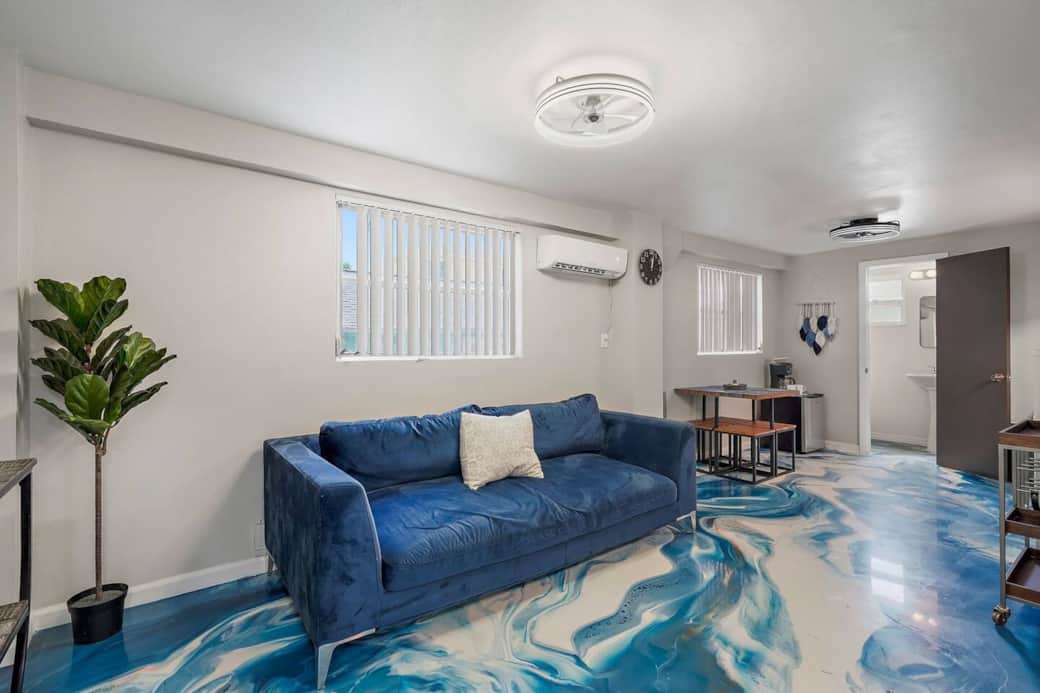 Living room with smart tv, sleeper sofa, and Stanford couch