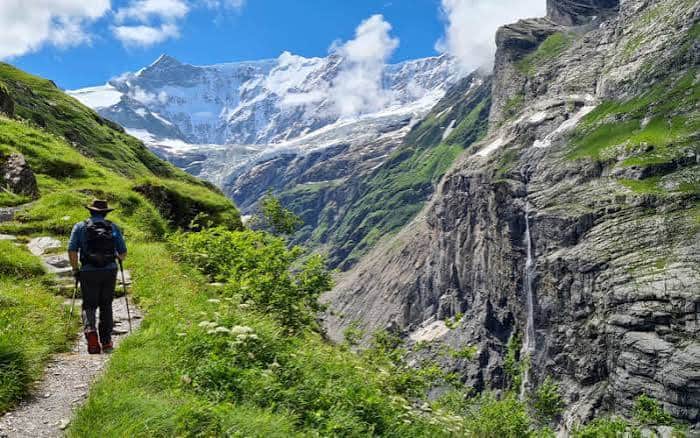 Summer hiking in Grindelwald with Alpine mountain views