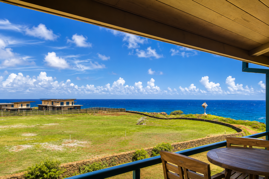 Sweeping ocean view from the comfort of the covered lanai.