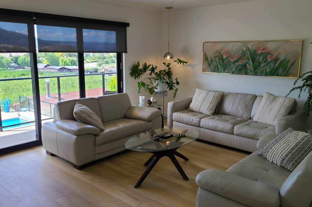 This comfortable living room seats 10. (Other chairs are not visible from this angle :)