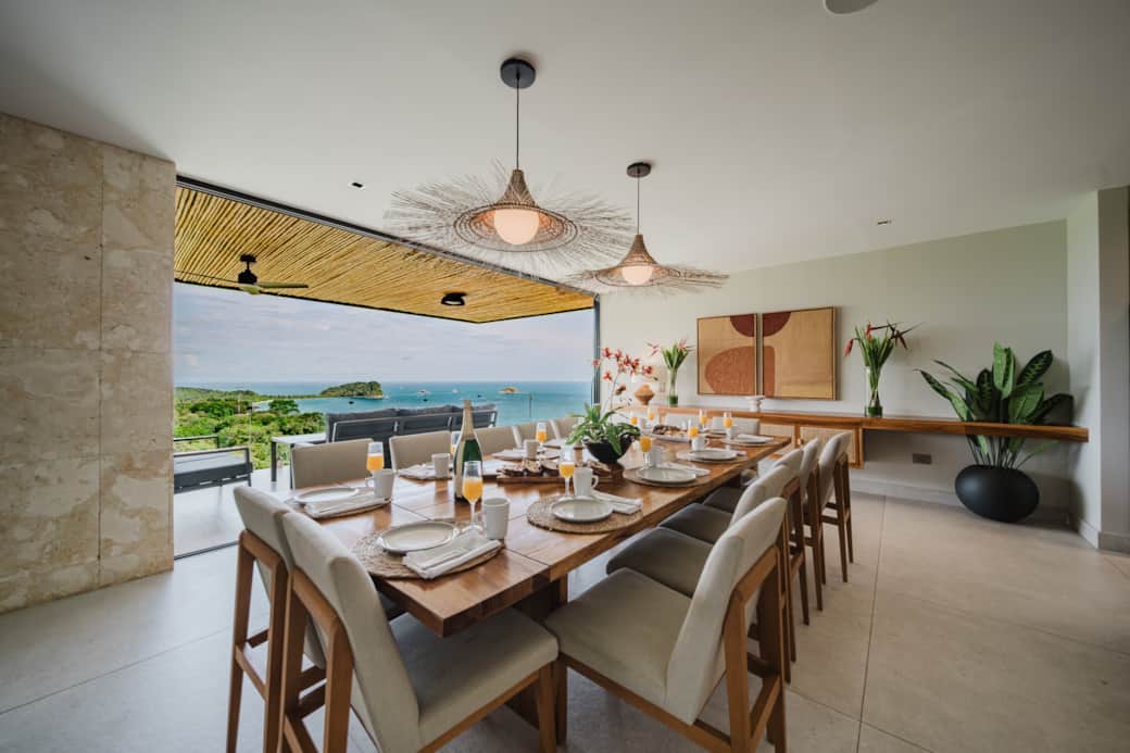 Comfortable dining area to enjoy meals together indoors Comfortable dining area to enjoy meals together indoors