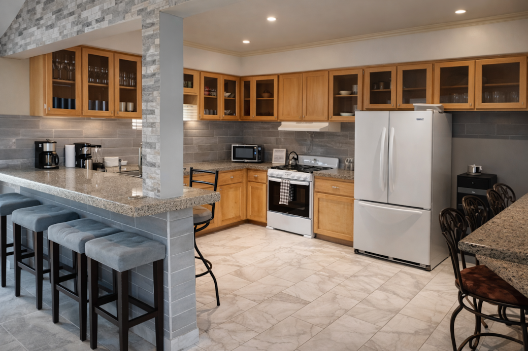 Modern kitchen with granite breakfast bar 