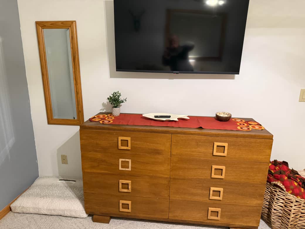 Two Queen Bedroom - dog bed under mirror under mirror, 55" Smart TV