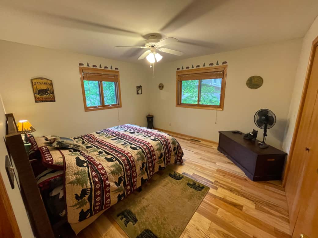 Main floor "Bear" bedroom with hickory floors