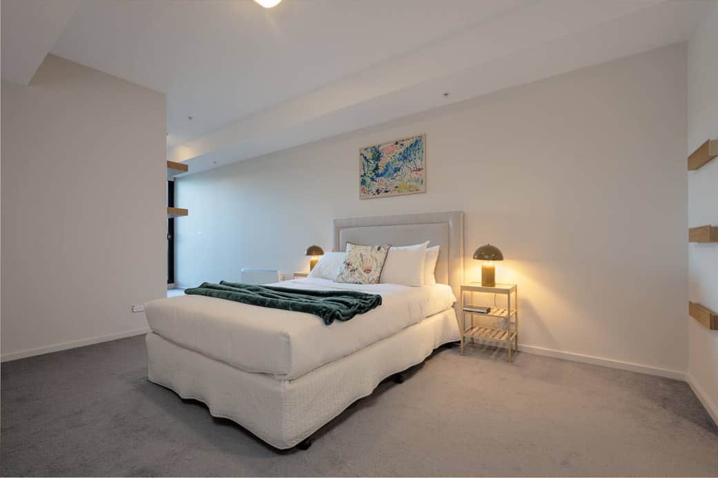 Spacious master bedroom with queen sized bed