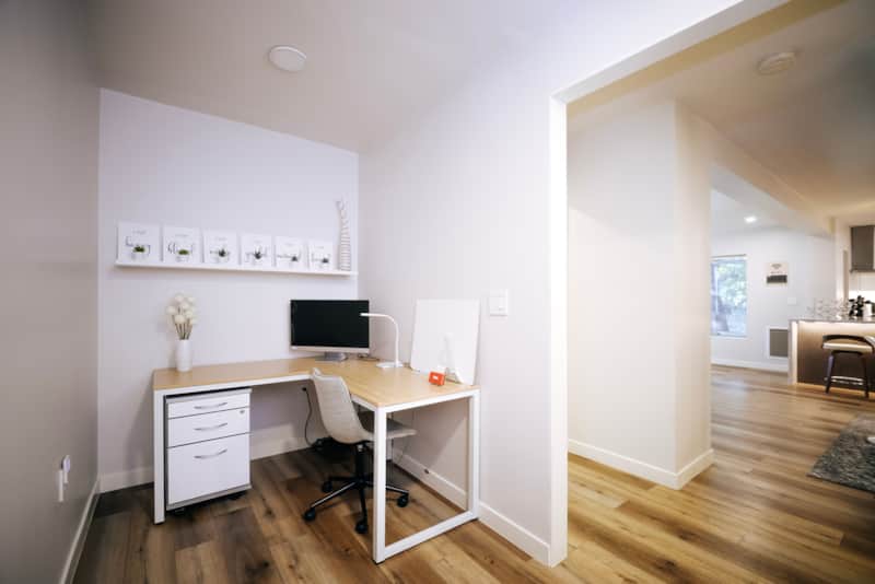 Dedicated desk and chair in the office area, close to the main living spaces.