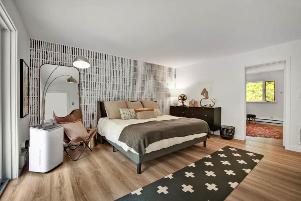 King Bed, AC, connected to the second bedroom, on suite bathroom, access to patio. 