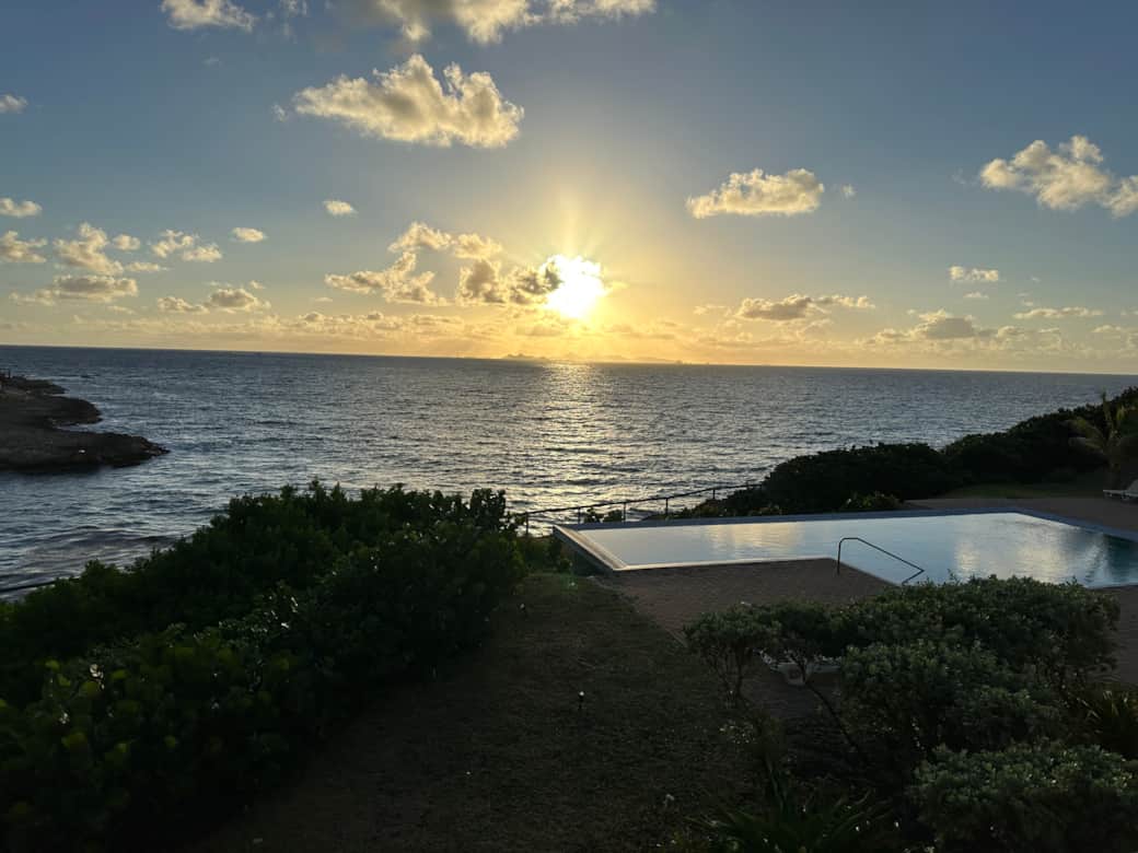 Sunrise @ Oceanview overlooking infinity pool and ocean 