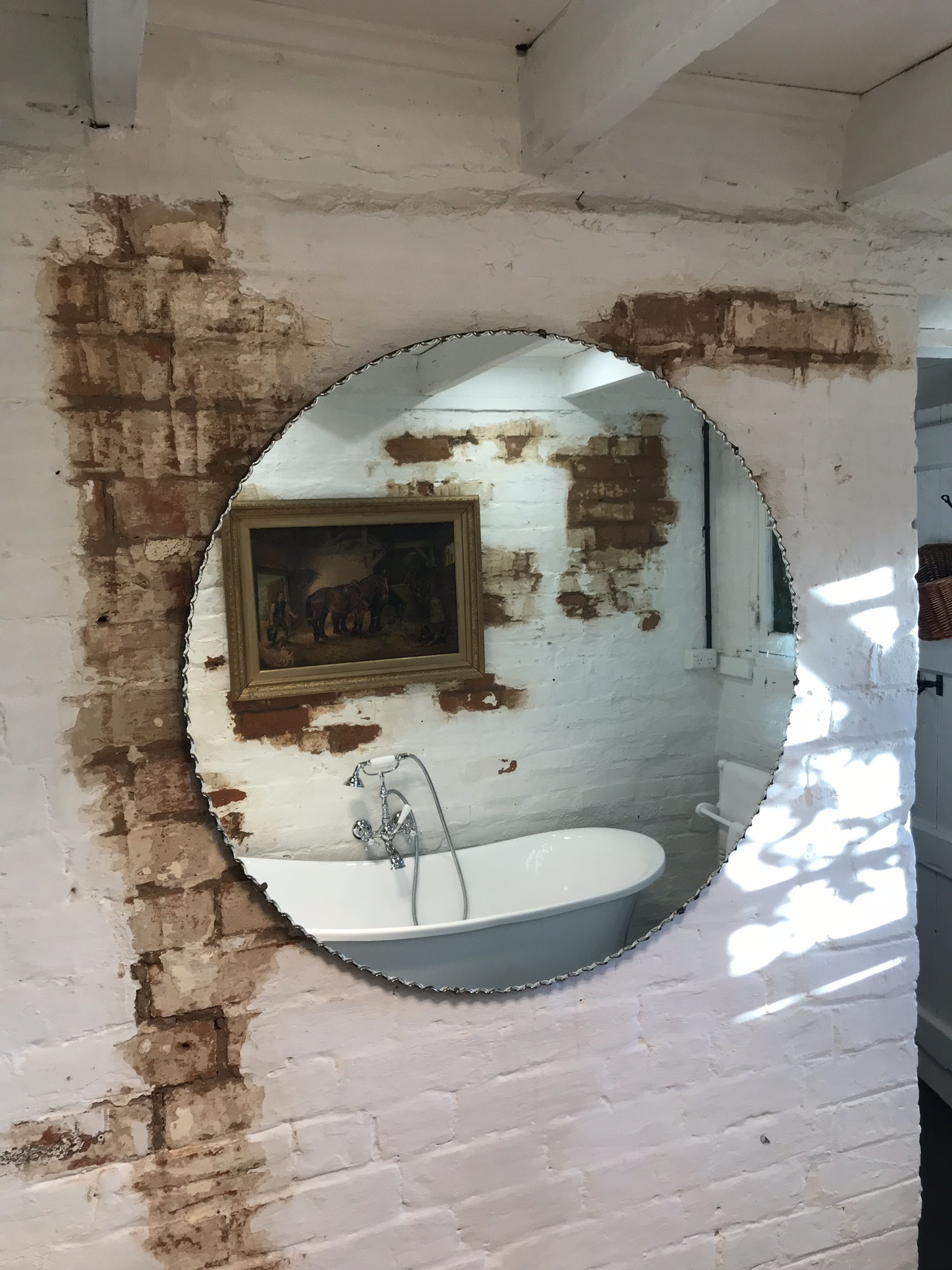 Bathroom with clawfoot bathtub and shower