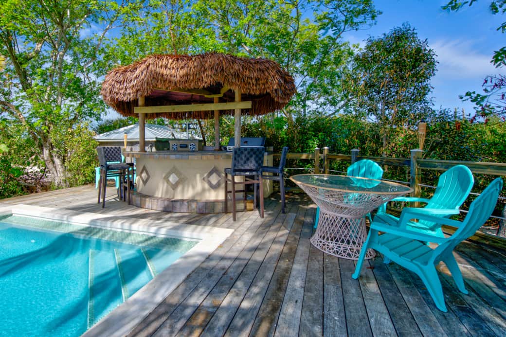 Tiki with BBQ and Bluetooth Speakers Tiki with BBQ and Bluetooth Speakers