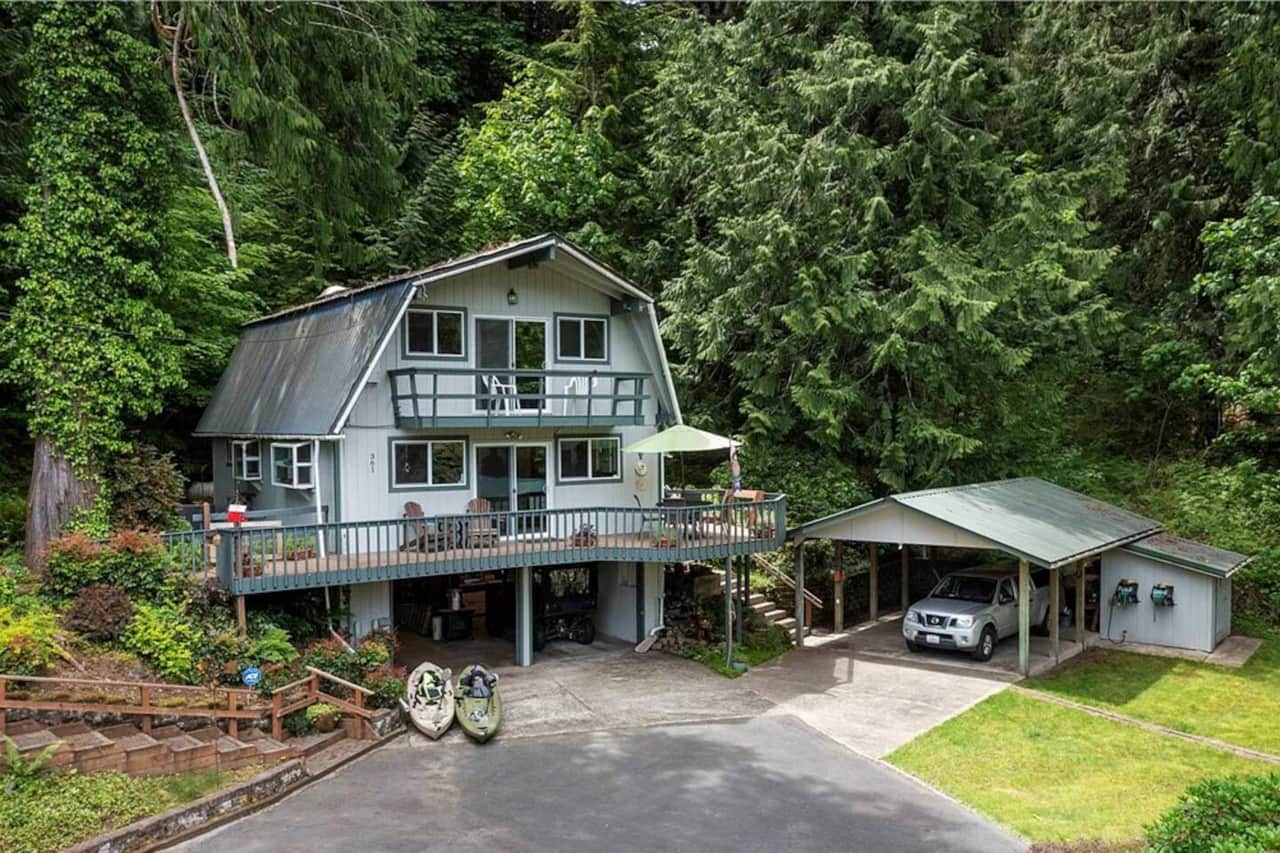 Carport for you, and a great deck for grilling and watching the river.
