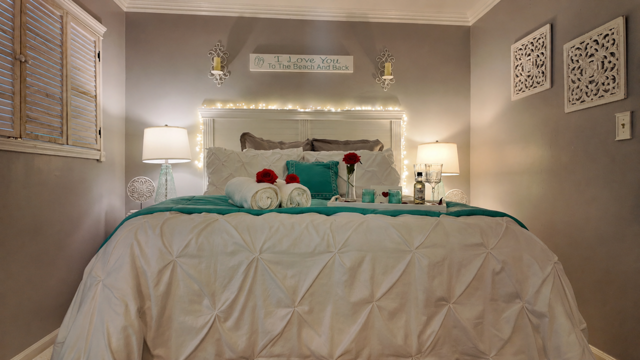 Your queen bedroom with pillowtop mattress and soft bedding. Window opening with shutters to close 