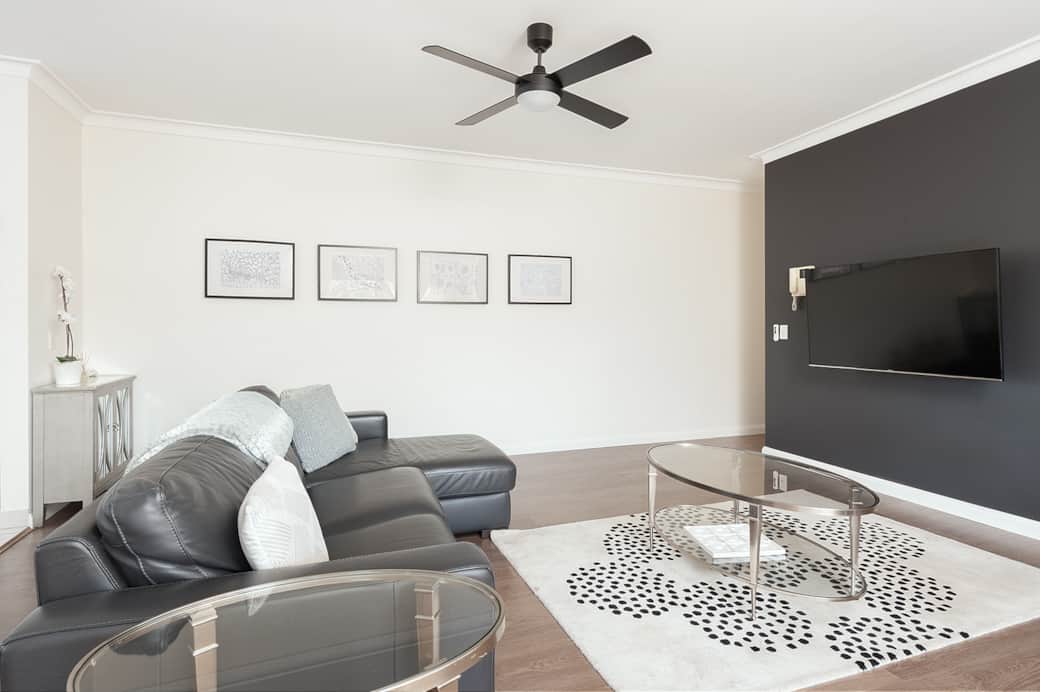 Relax on the leather sofa with cable TV