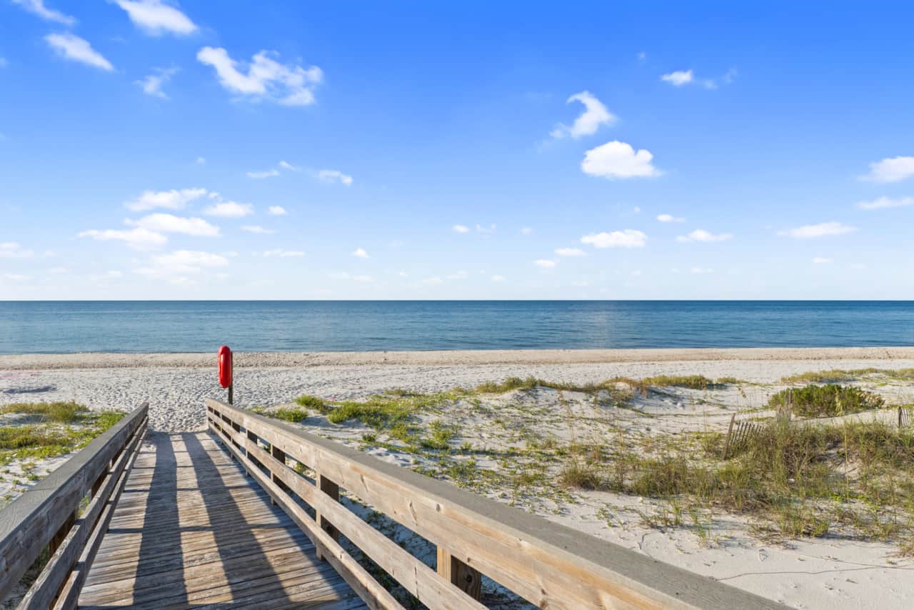 Private beach access via the 300 Ocean Mile community boardwalk—no roads to cross.